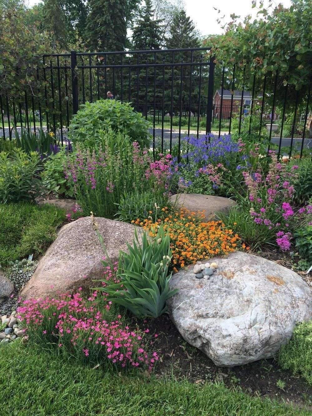 Working in rocks into your garden and beds is a beautiful way to add…