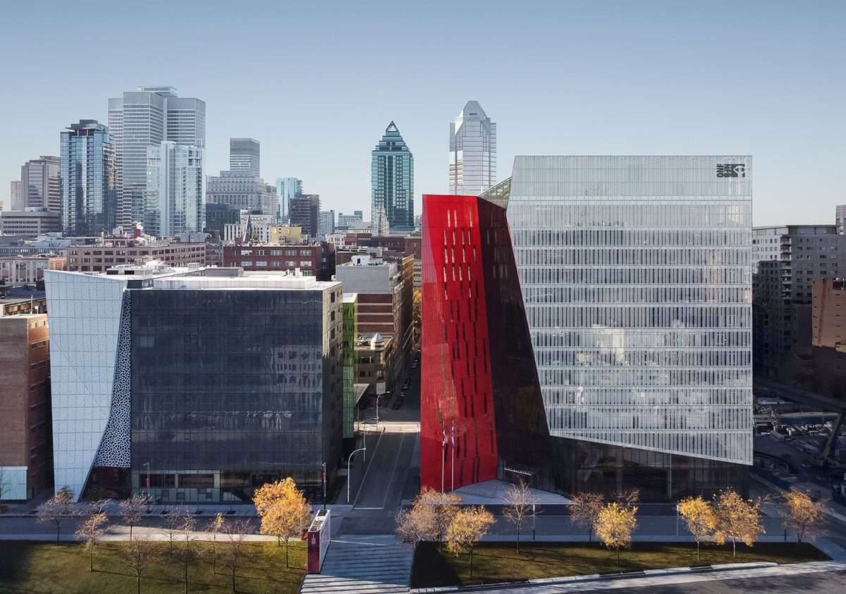 Excavation of a mixed-use office tower with a red diagonal in Montreal
