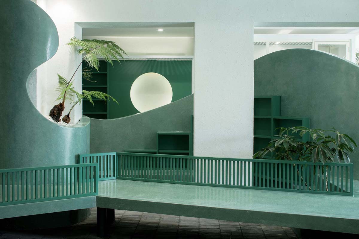 Landscape design for book store and café with misty pond