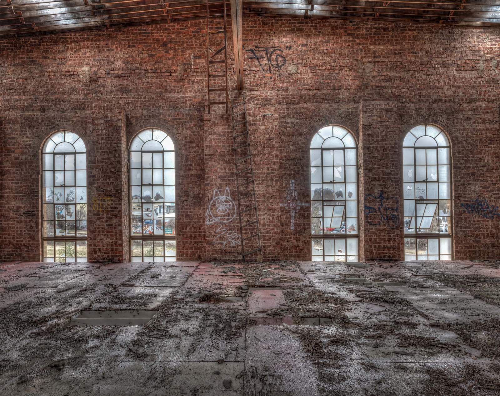 windows in an empty warehouse space