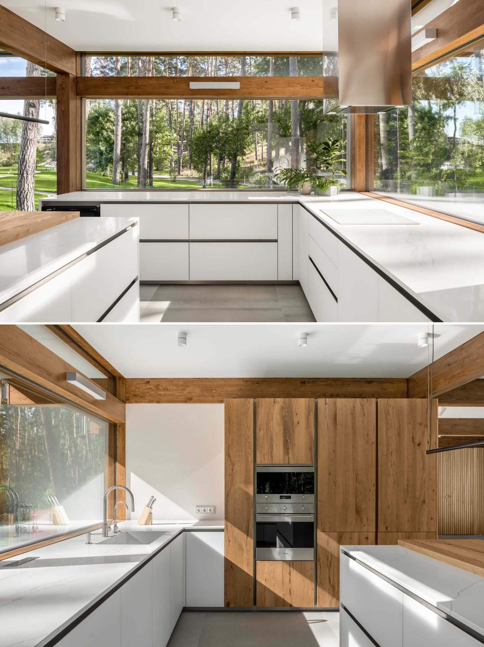 A modern kitchen with large windows that line both walls.