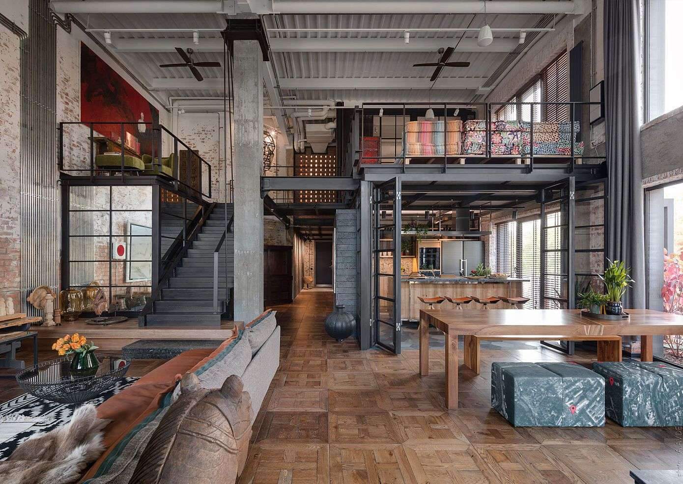 Un loft avec terrasse à la décoration industrielle inspirée par l’Asie Ce loft de…