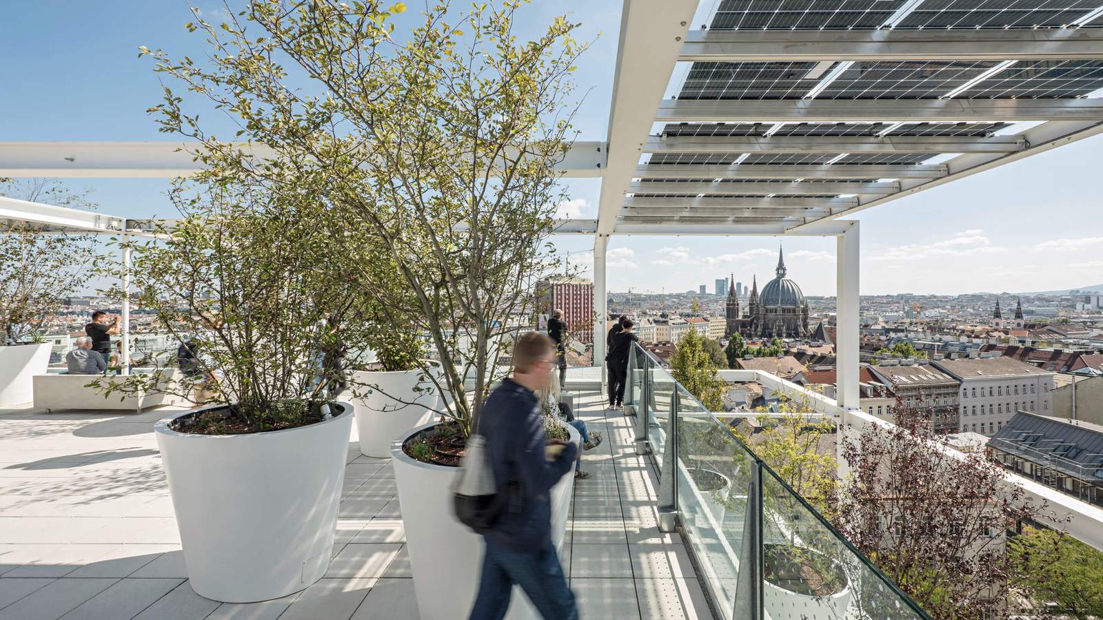 Public rooftop space with a city view