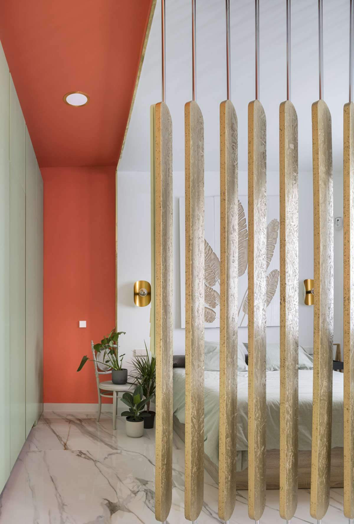 Converting a former store into an apartment with colorful cabinets