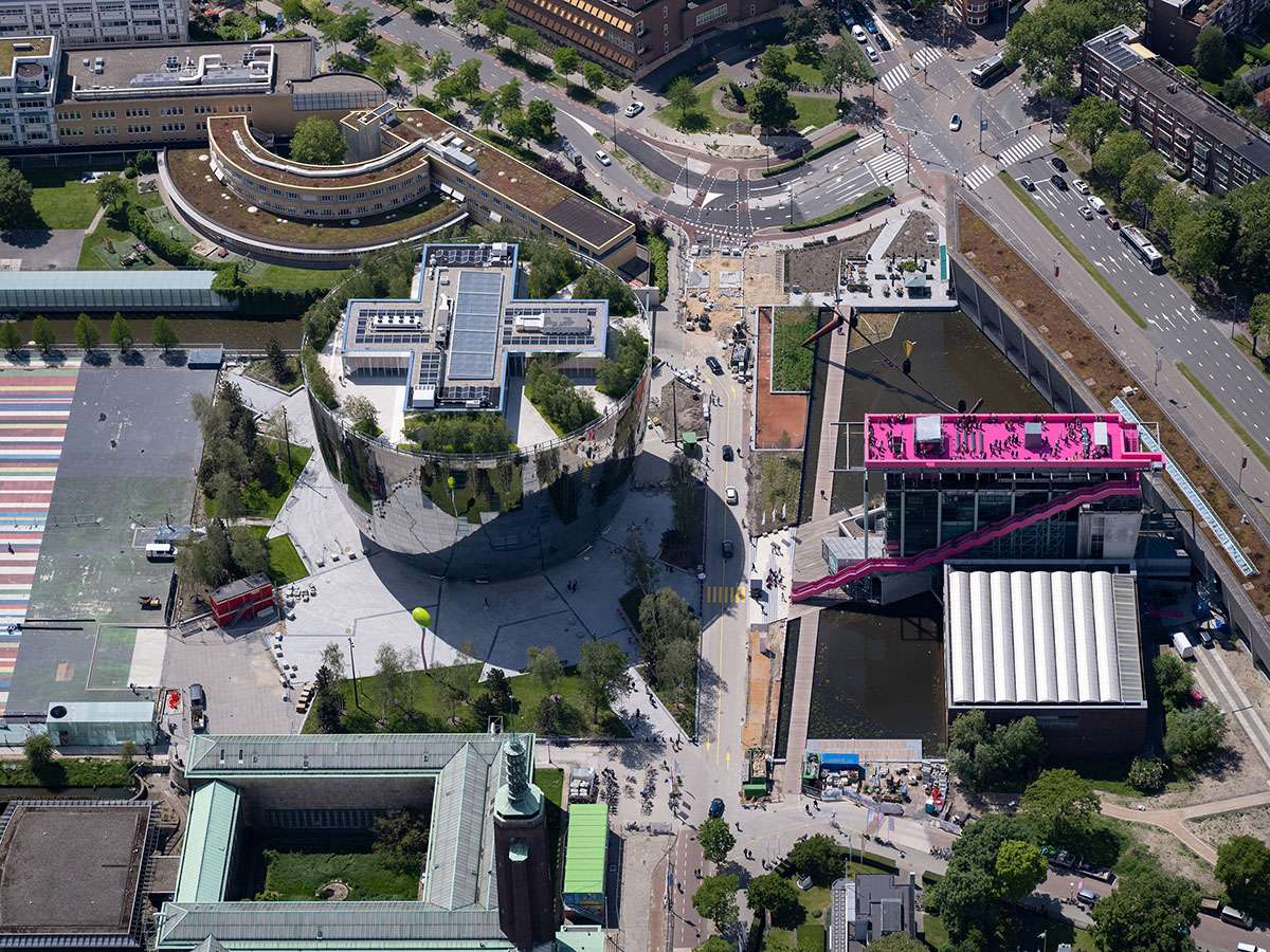 Completing a pink staircase on the roof of the Het Nieuwe Institute