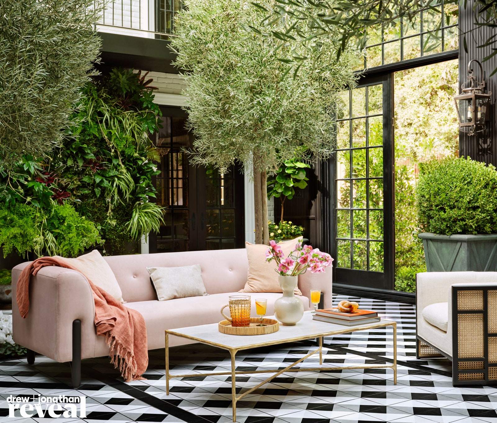 The check pattern of the graphic tile elevates the entire solarium space.