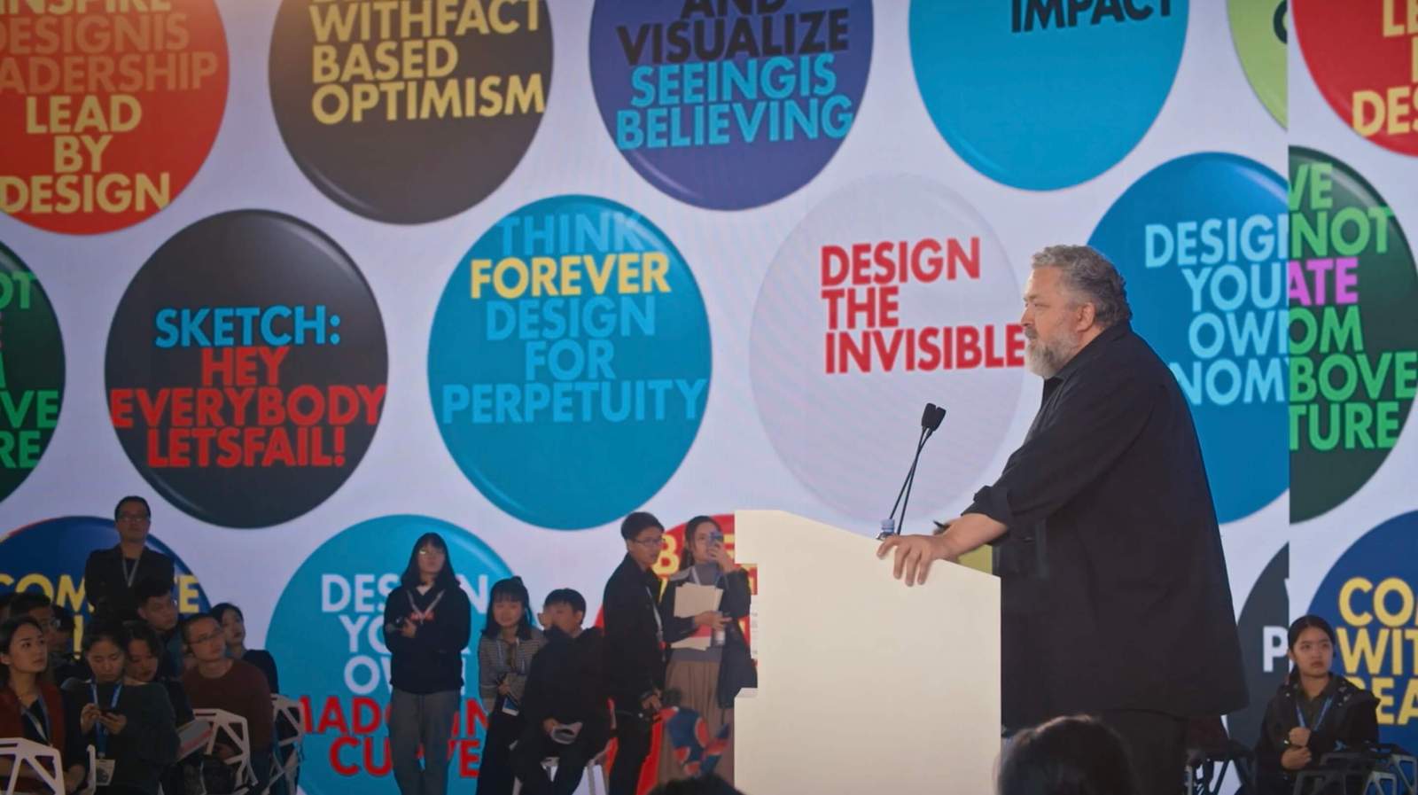 bruce mau giving a speech