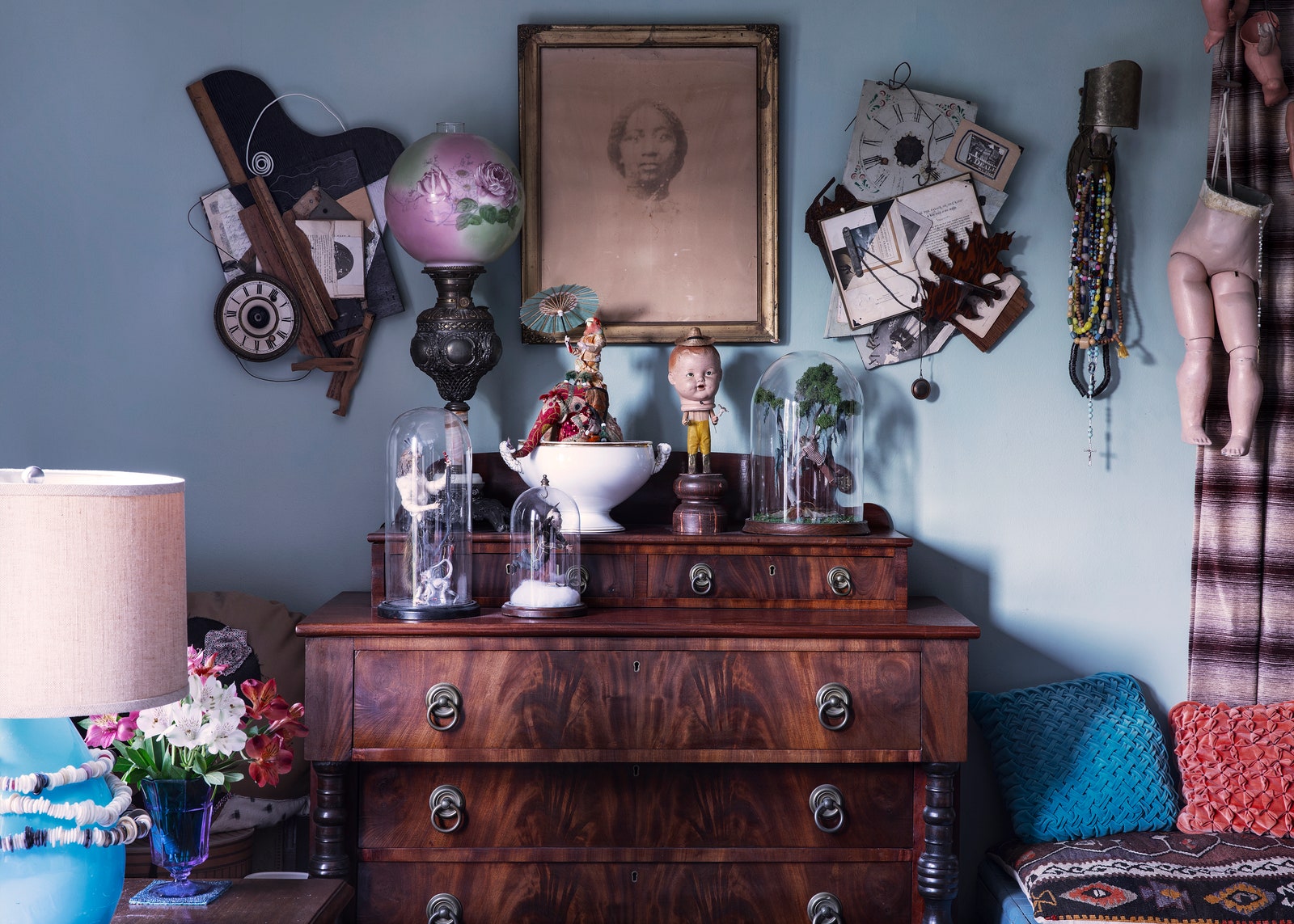 Image may contain Furniture Interior Design Indoors Human Person Kartini Cabinet Shelf Plant Living Room and Room