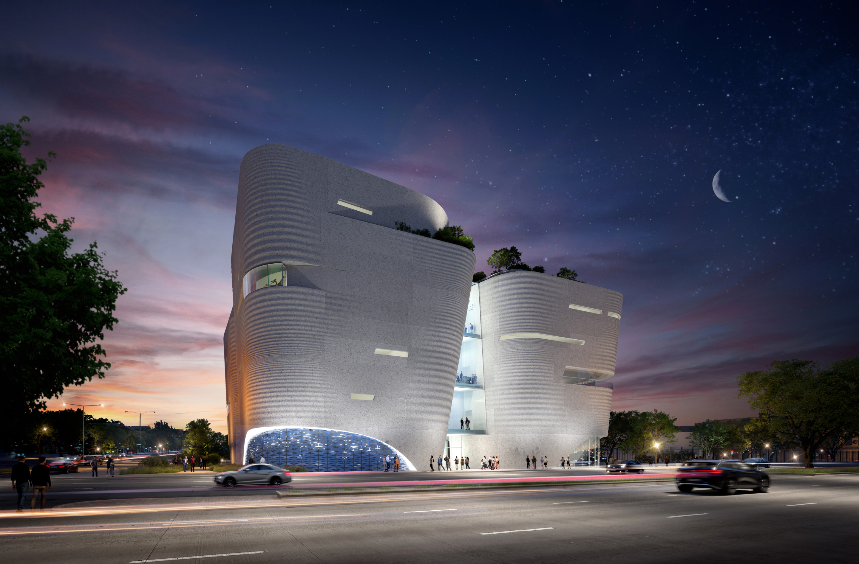 a building with an organic, layered form at night