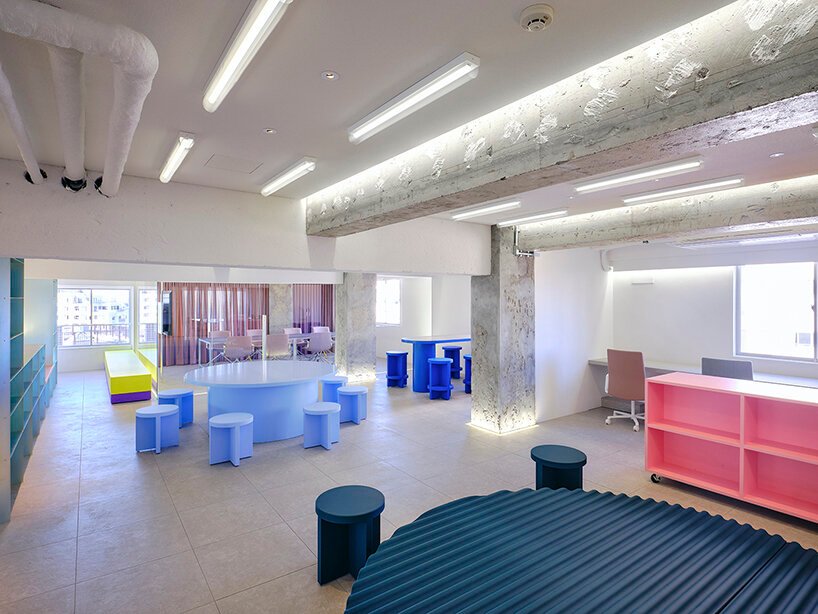 kii injects workspace in tokyo with a satisfying palette of blue, pink, and yellow tones