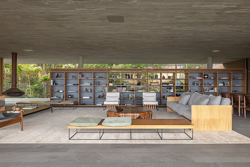 stilted 'minas house' by studio MK27 rests amid a rainforest garden in brazil