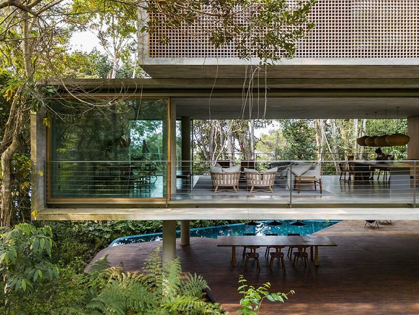 stacked + elevated, studio MK27's 'casa azul' seemingly fades into the brazilian flora