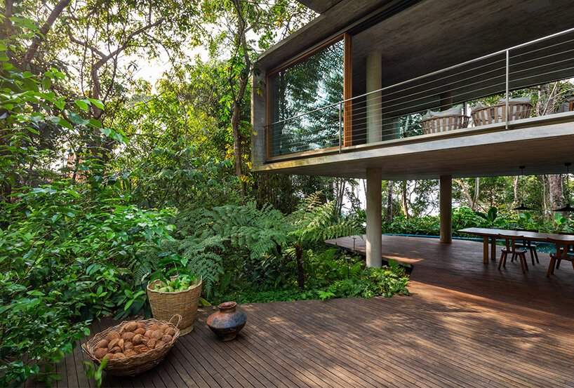 stacked + elevated, studio MK27's 'casa azul' seemingly fades into the brazilian flora