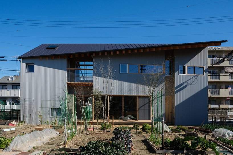 kitokino architecture composes 'anjou house' as three linked blocks in suburban japan
