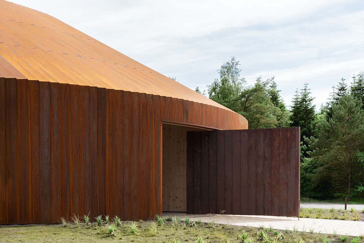 Denmark's new refugee museum complete with curved steel volume