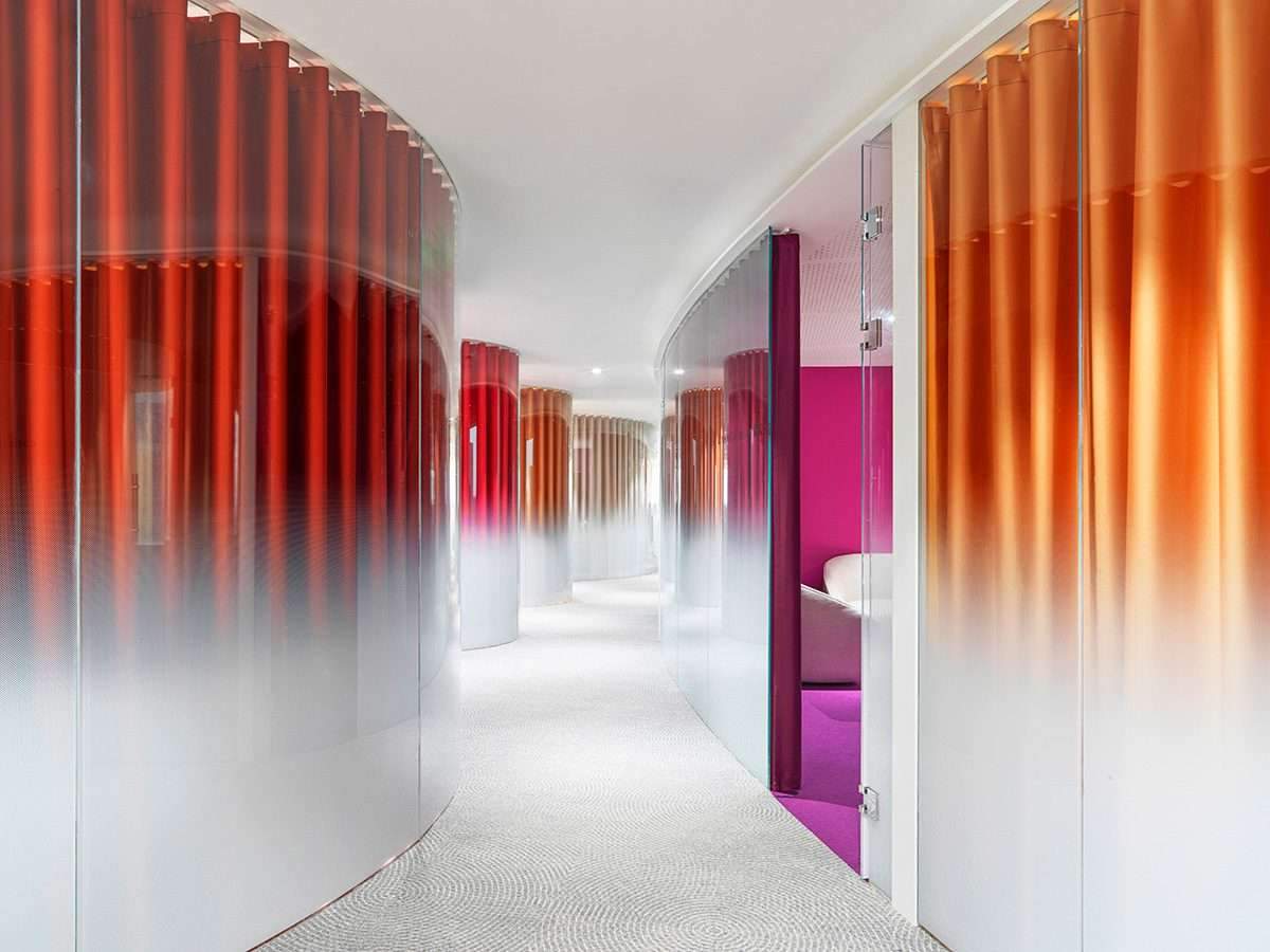 Create office interiors using transparent circular volumes