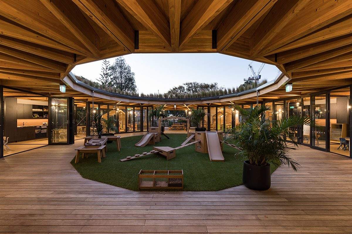 Building an educational center for children with a green circular roof
