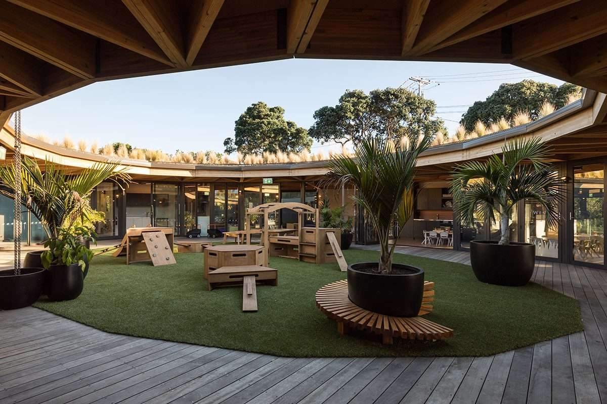 Building an educational center for children with a green circular roof