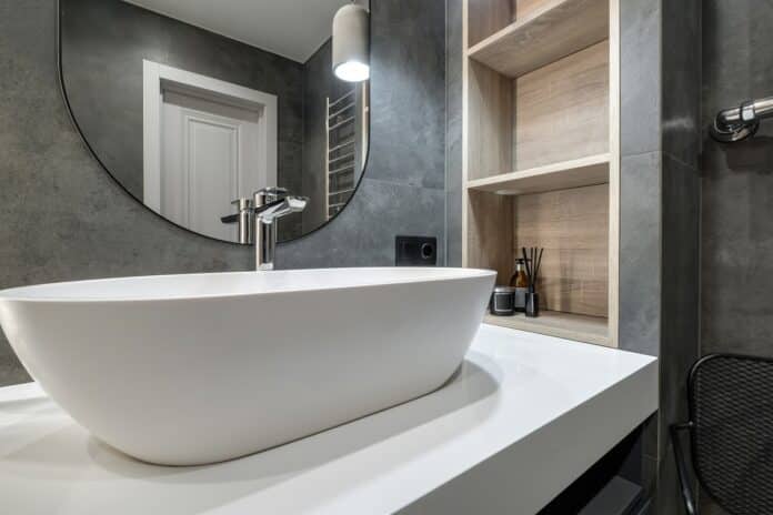 How To Install A Vessel Sink Faucet 1 metal water tap with sink and faucet to turn on and regulate cold or hot water in expensive bathroom.