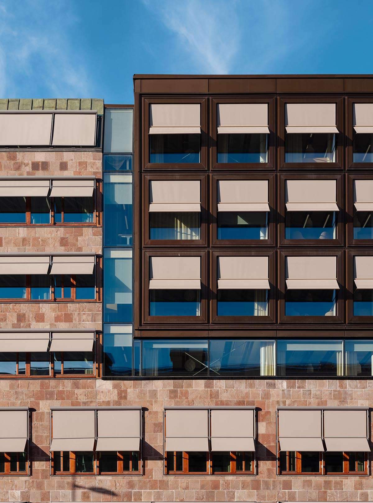 Transformation of the old Swedish town hall with an inner courtyard and glass roof