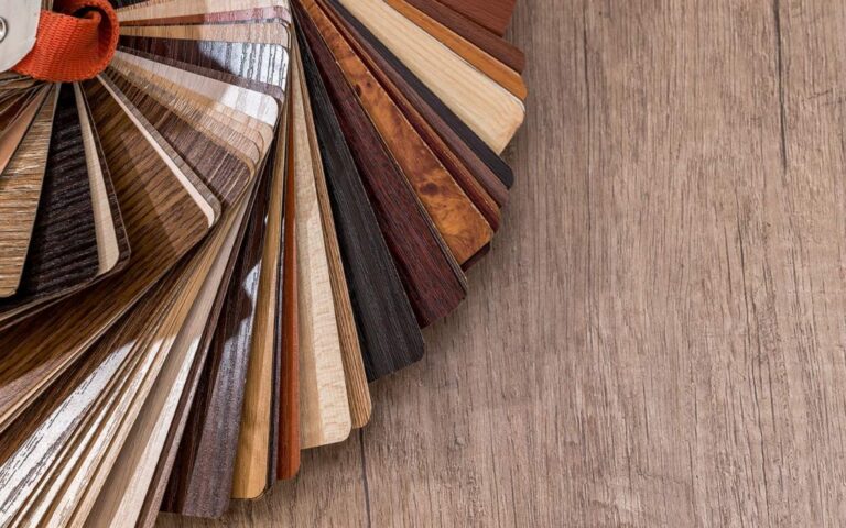 Different samples of wooden flooring types (solid, parquet, synthetic).
