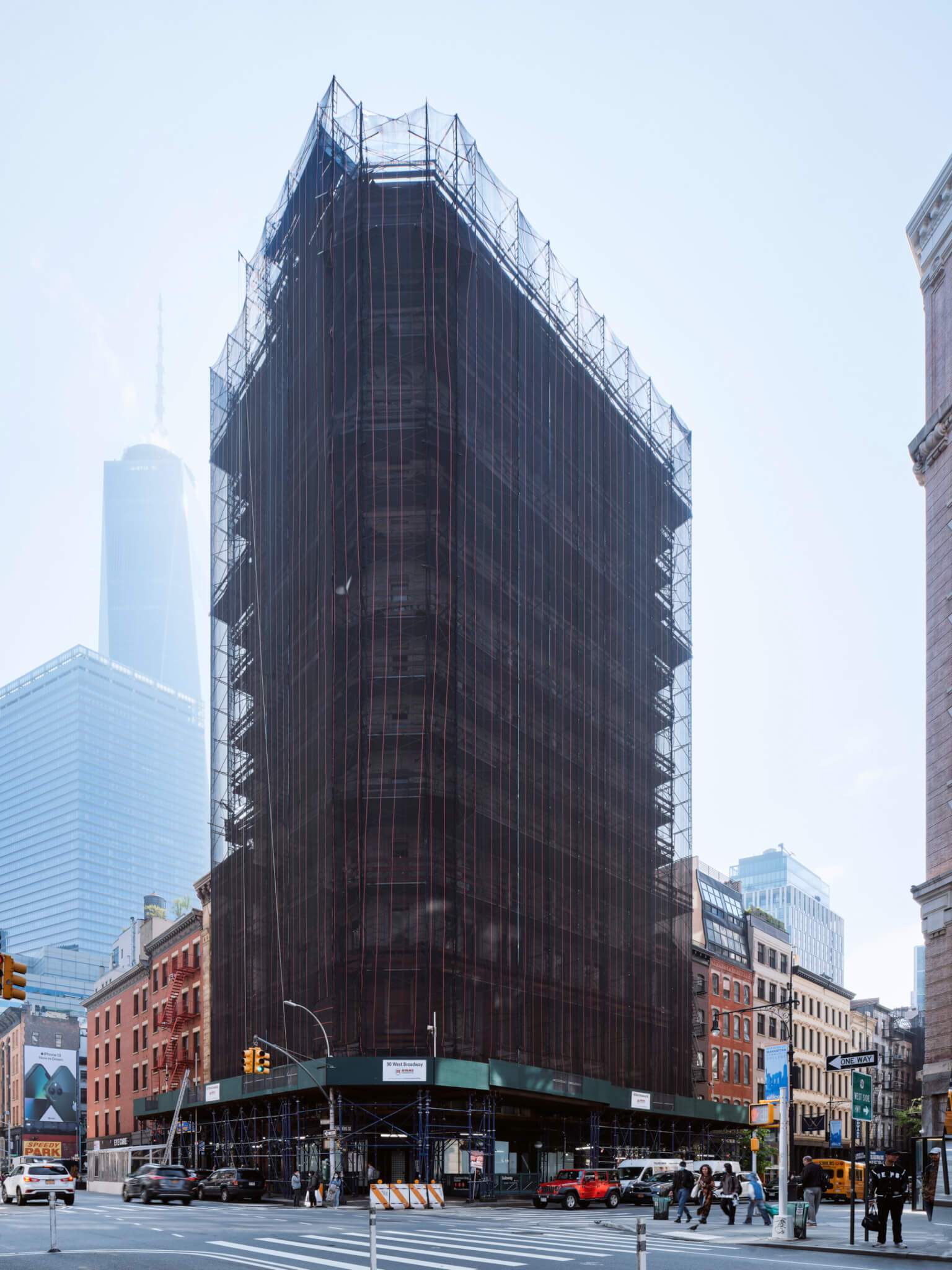 a nyc high-rise clad in scaffolding