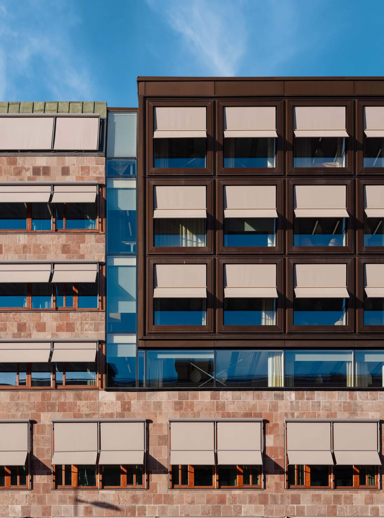 close up of a metal and brick facade