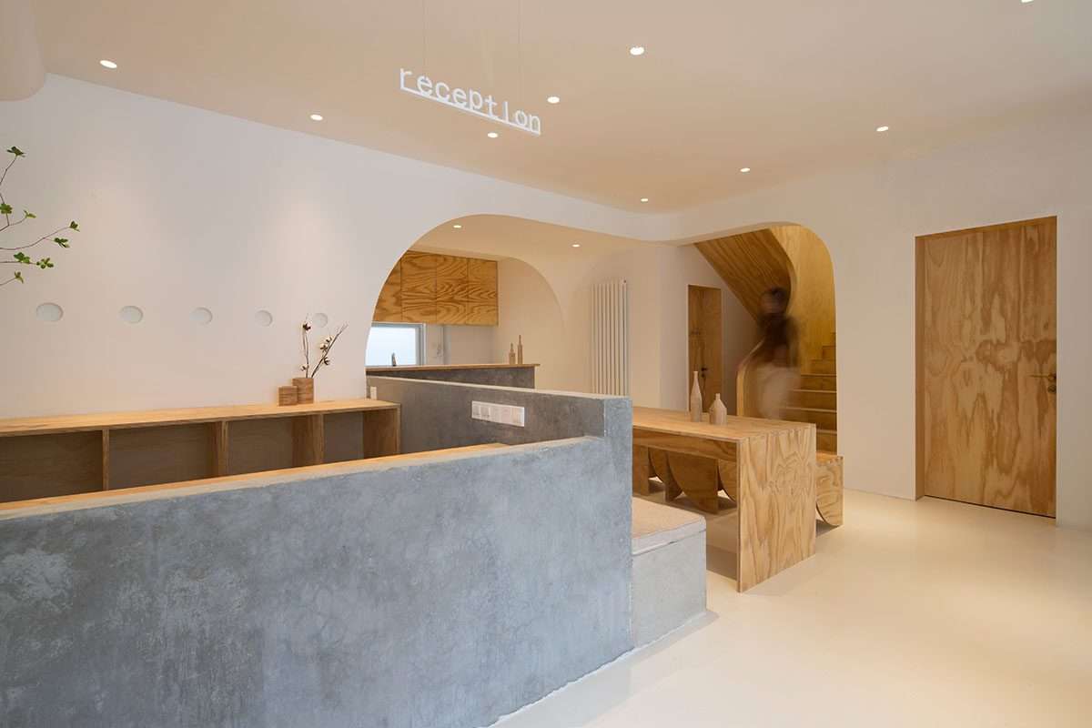 Creating a boutique hotel using flowing curves and sculptural geometric fixtures