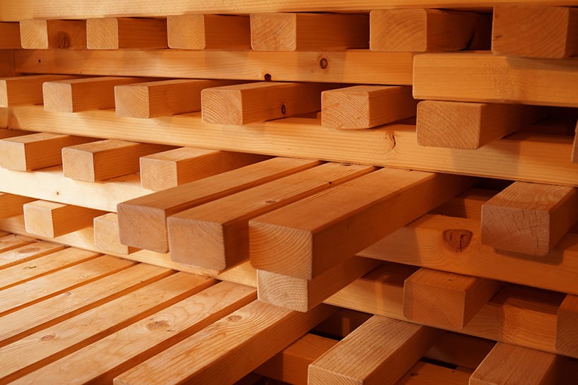 intertwined wooden beams sculpt sauna chamber by anders berensson architects in norway