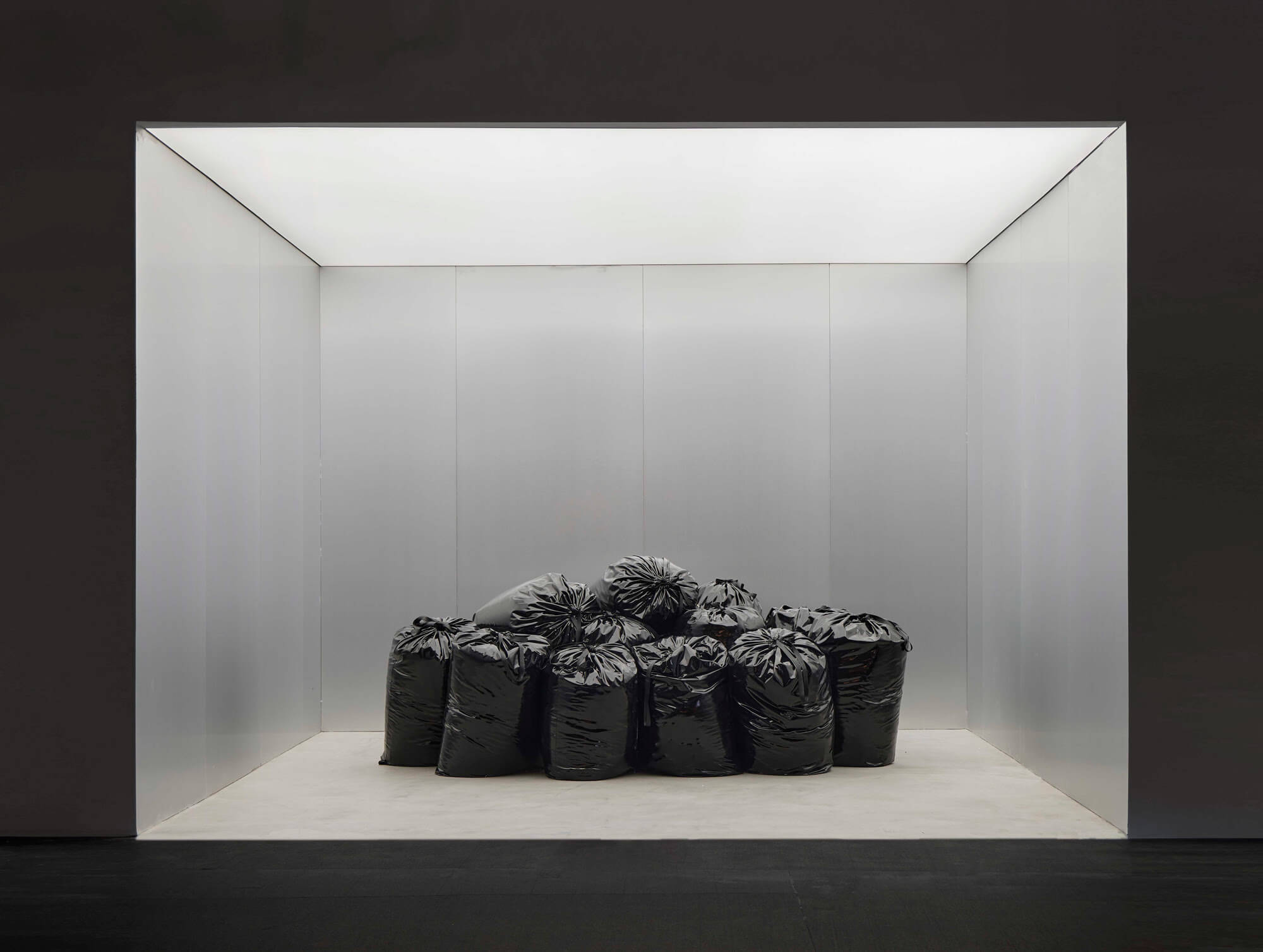pile of black trash bags