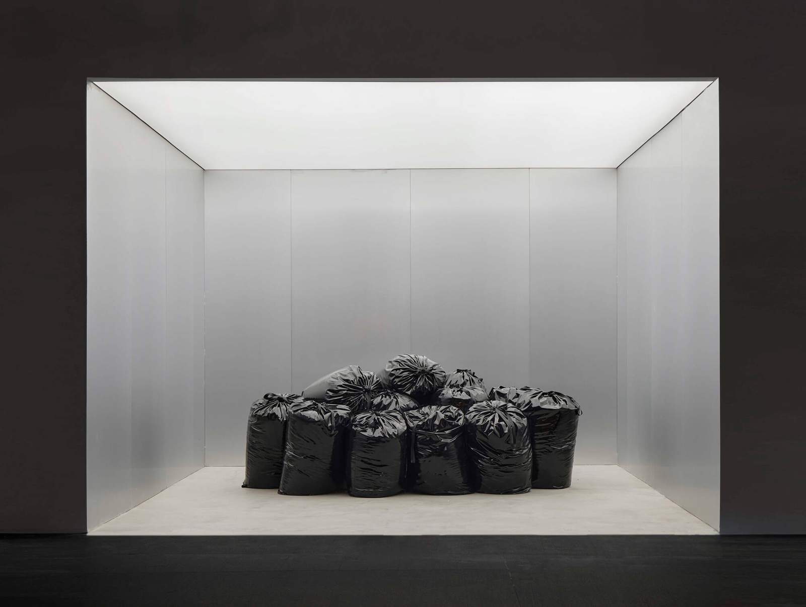 pile of black trash bags