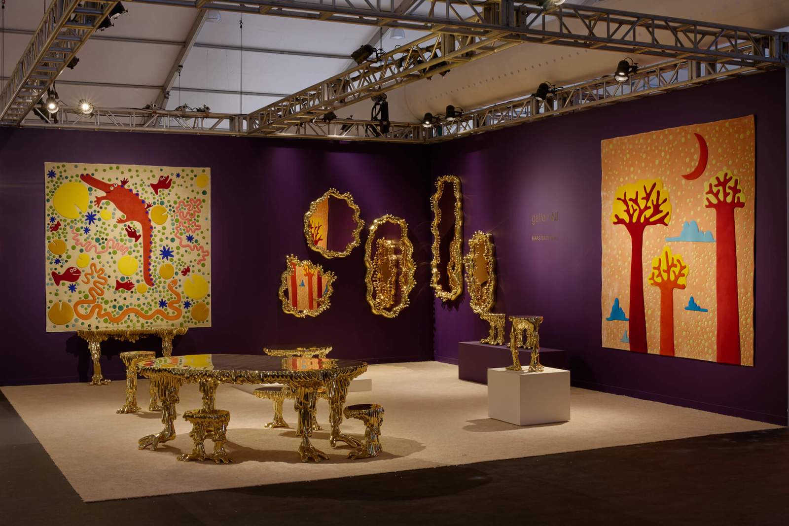 gold furniture with artwork featuring playful animals