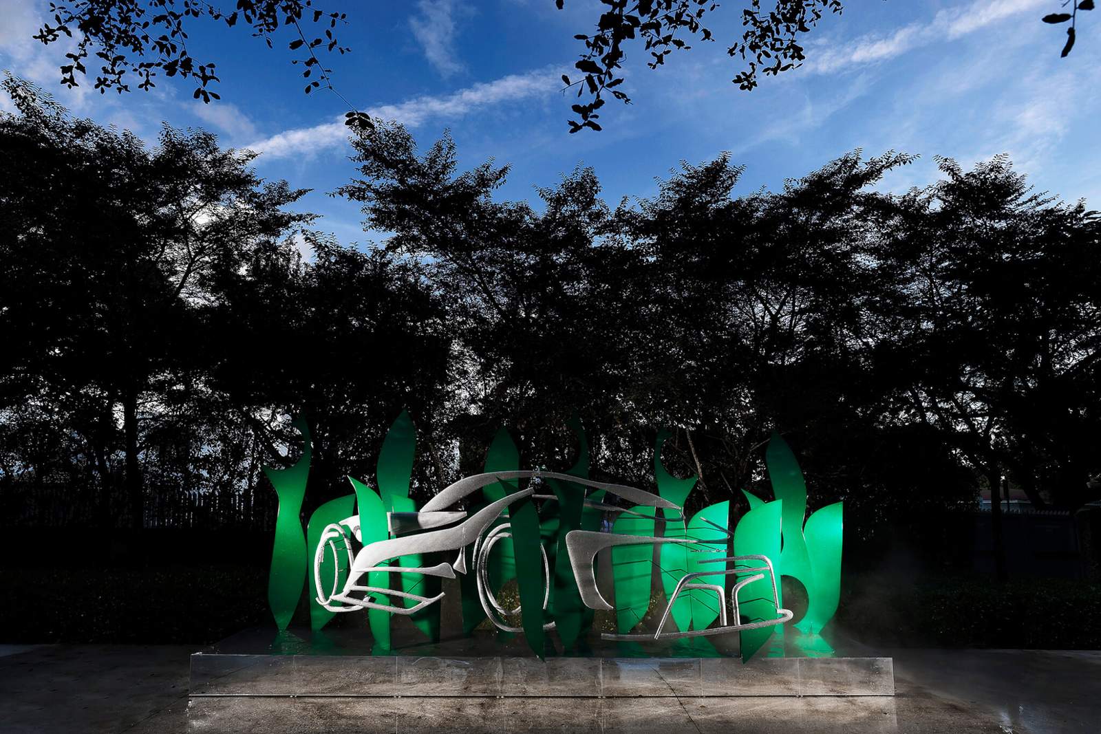 green sculpture at night