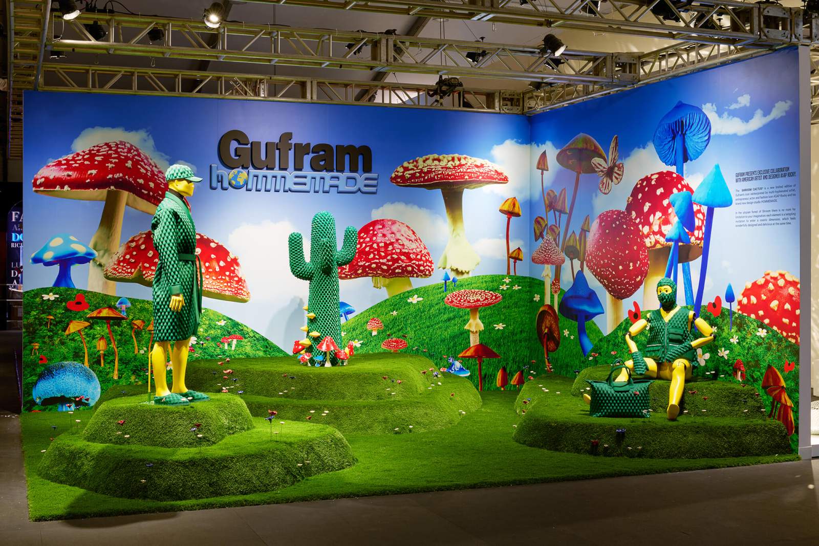grassy installation with mushrooms and other plantings