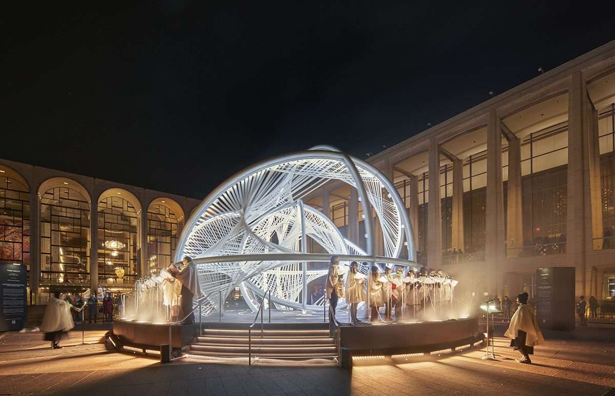 Design a kinetic sculpture representing the world's most linguistically diverse city
