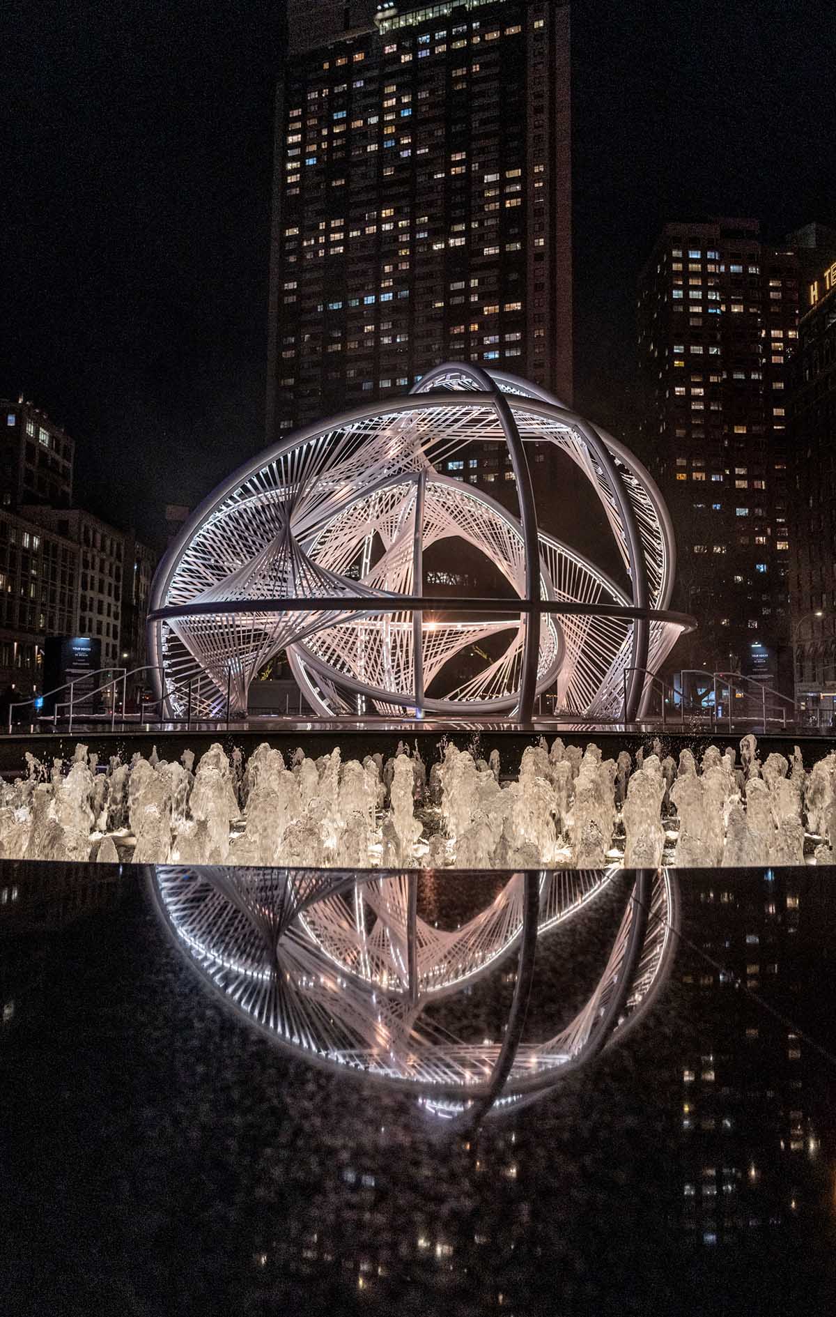 Design a kinetic sculpture representing the world's most linguistically diverse city