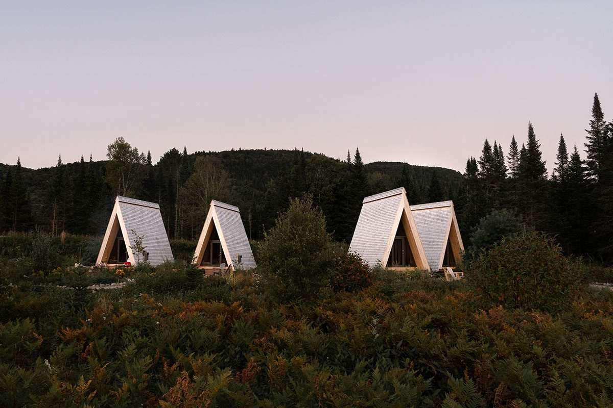 Embodying the wild beauty of the Canadian region for campers in four framed cabins