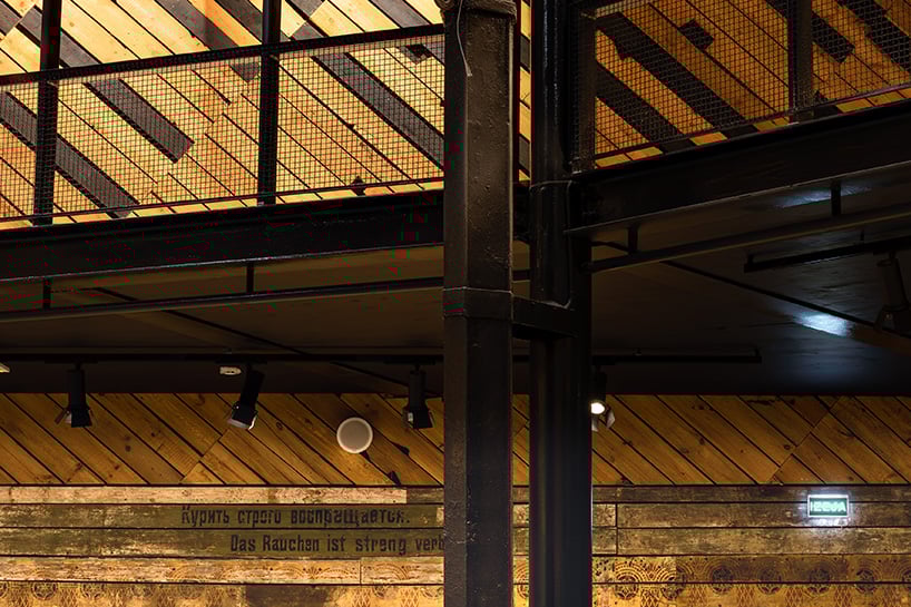 NRJA rebuilds riga's circus red dome with intertwined wooden panels