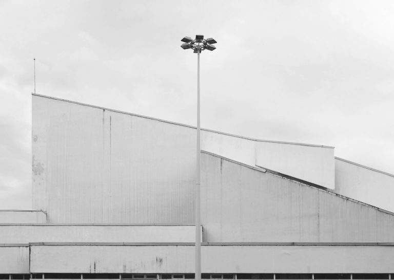 Close-up shot of the building's geometric exterior.