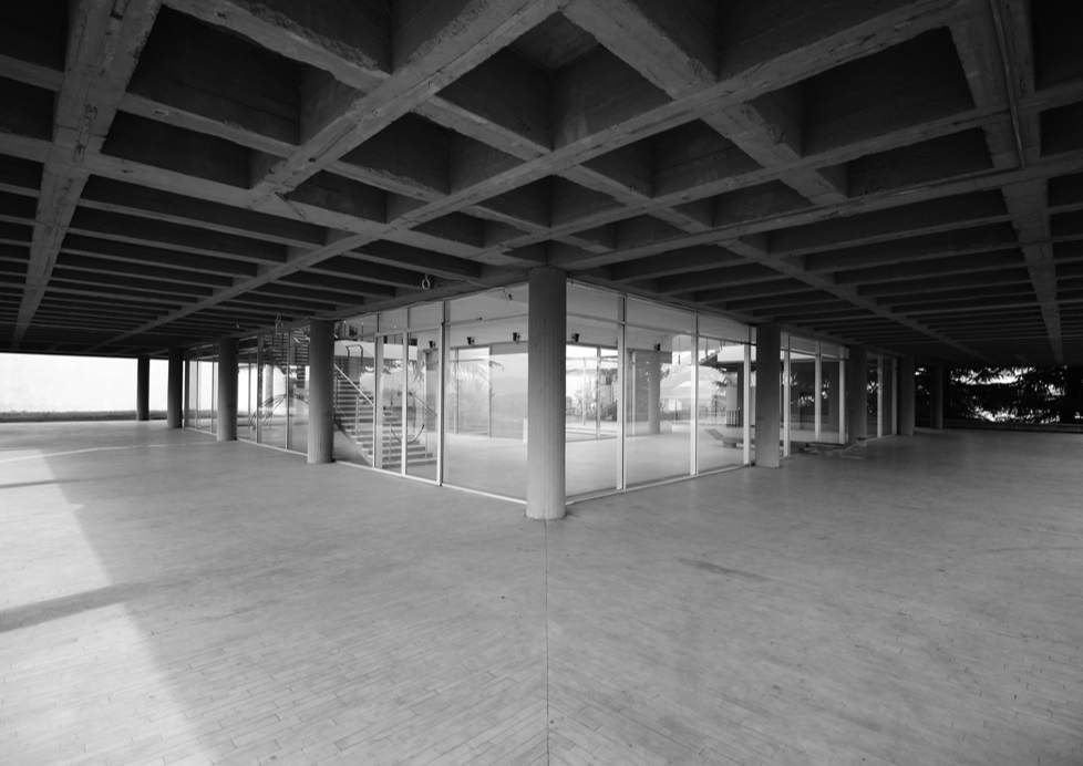 The Museum of Contemporary Art's glass facades and concrete columns viewed from outside. 