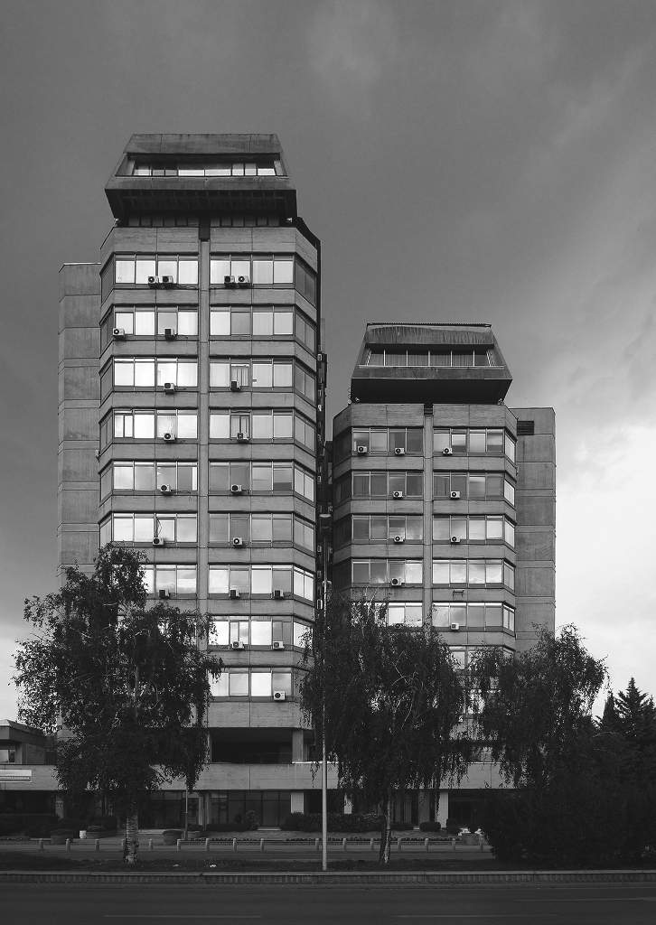 The two concrete and glass towers of the National Bank building.