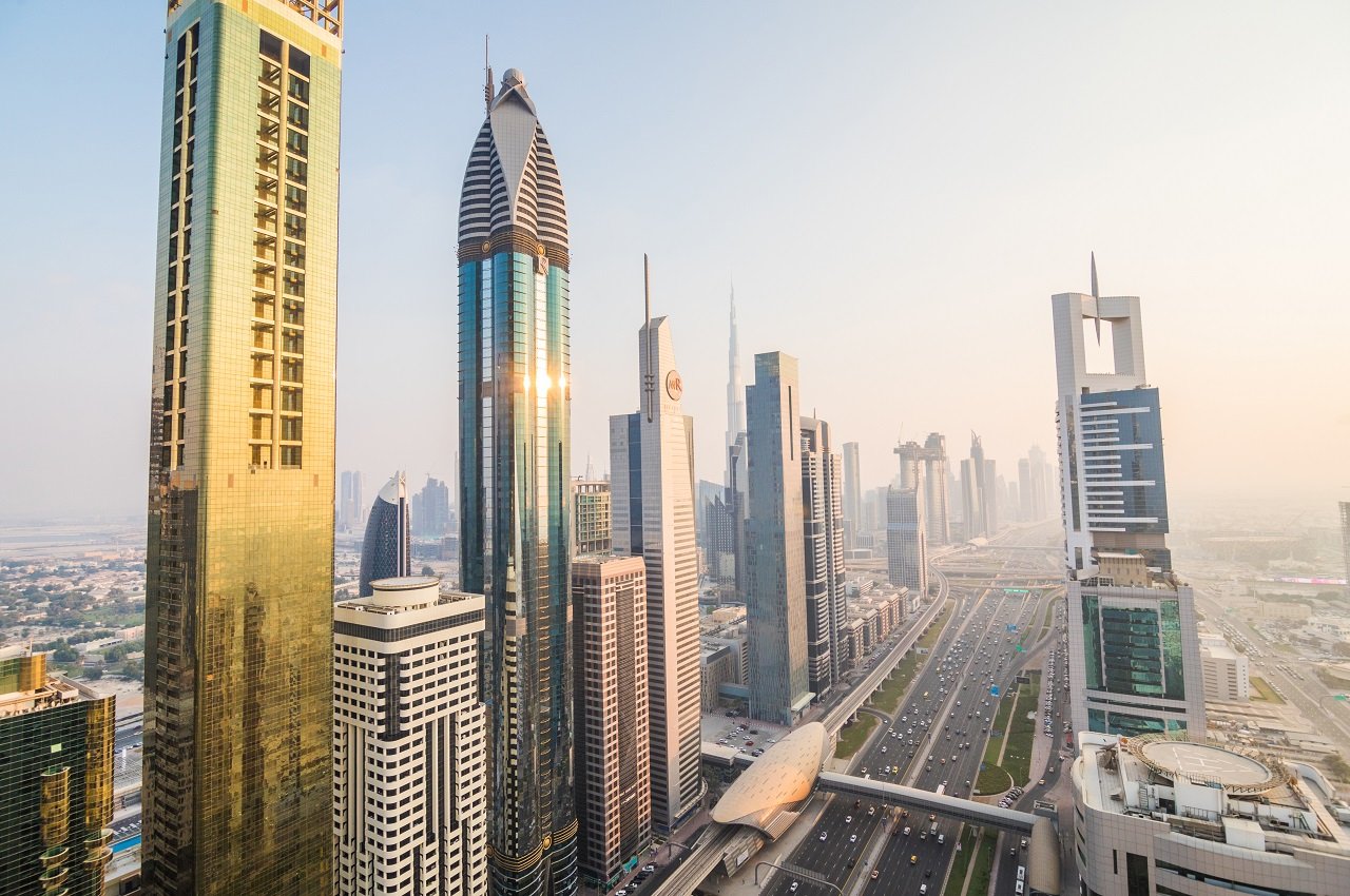 Dubai, uae - october, 2018. Dubai skyline and downtown skyscrapers on sunset. Modern architecture with highrise buildings on world famous metropolis in united arab emirates. Why do we need tall buildings?