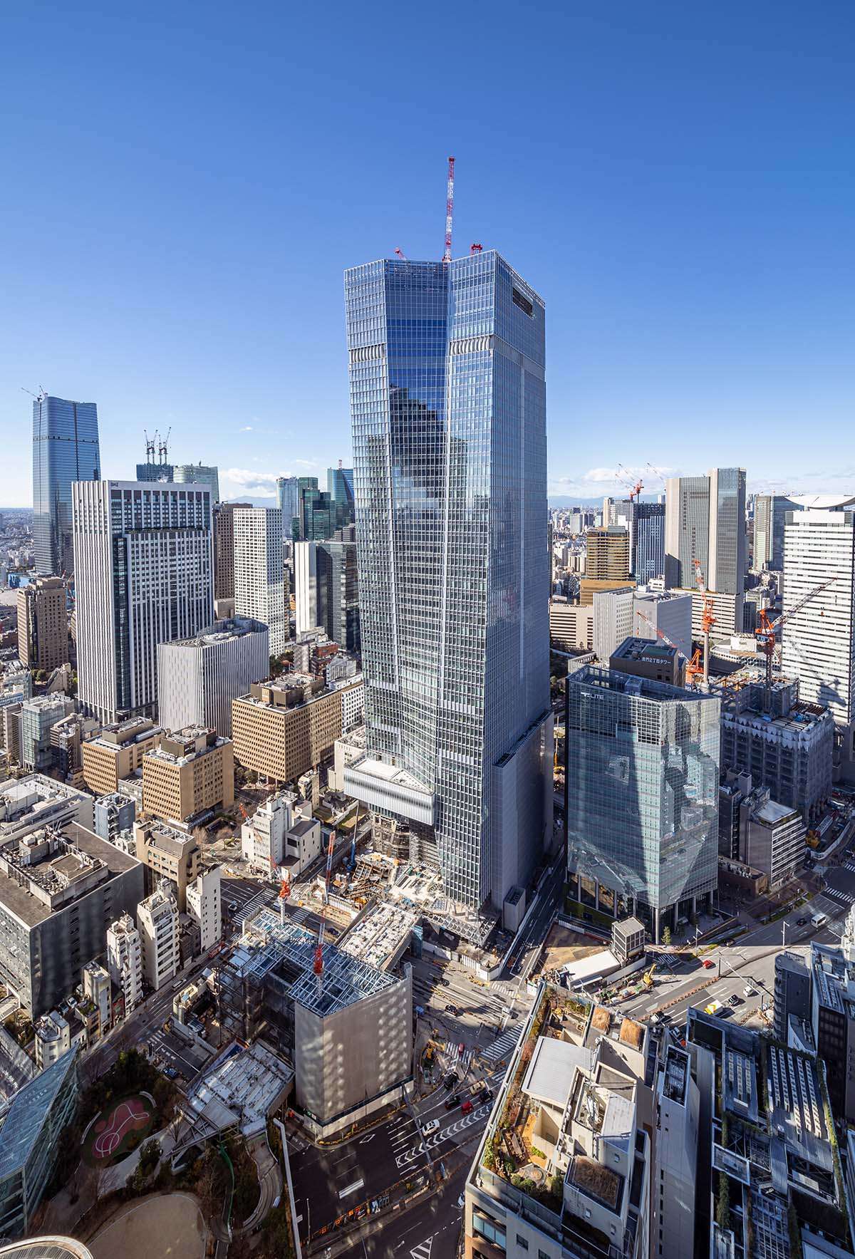 New designs and details released for OMA's first tower in Tokyo