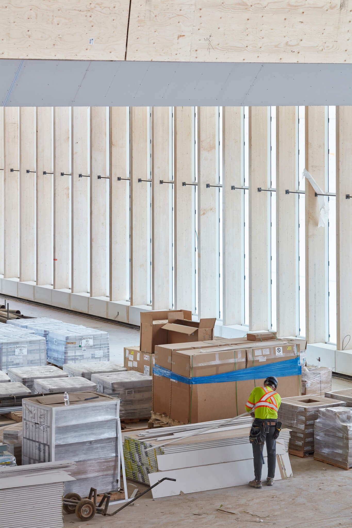 Construction photo of a glulam-framed building