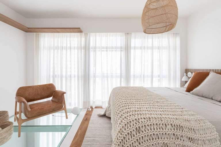 This Bedroom With A Partial Glass Floor Looks Down To The Living Room Below