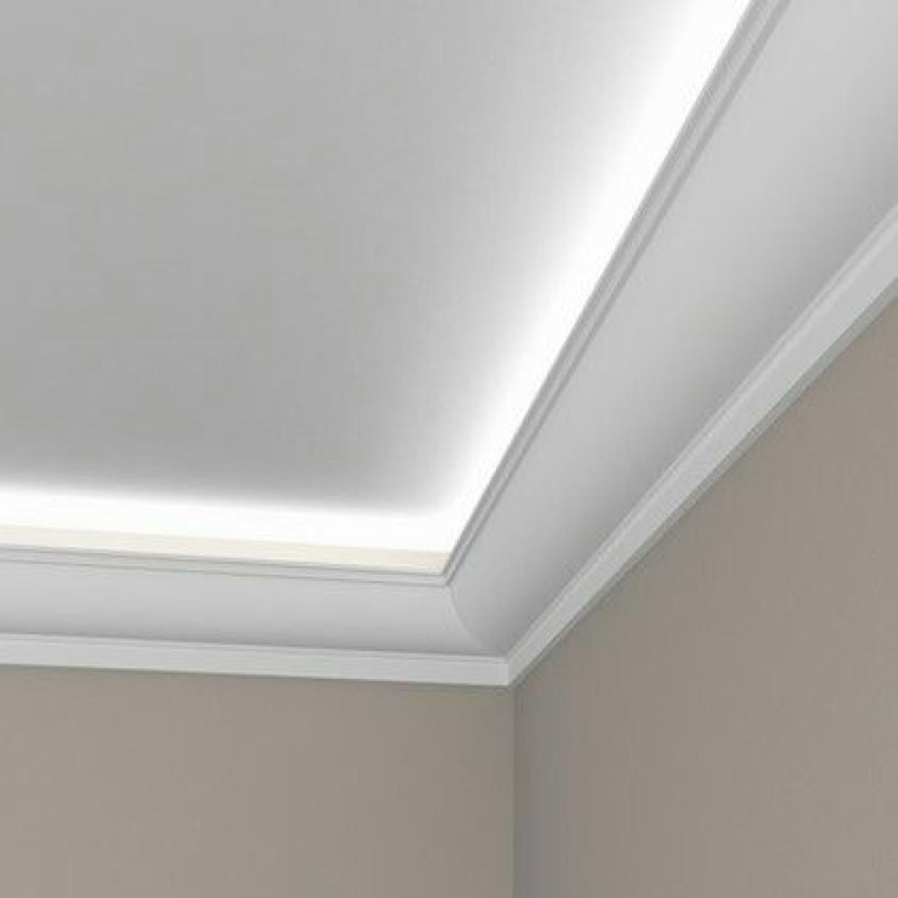 "Ceiling decorations made of stucco showing smooth and harmonious lines where the ceiling meets the wall."