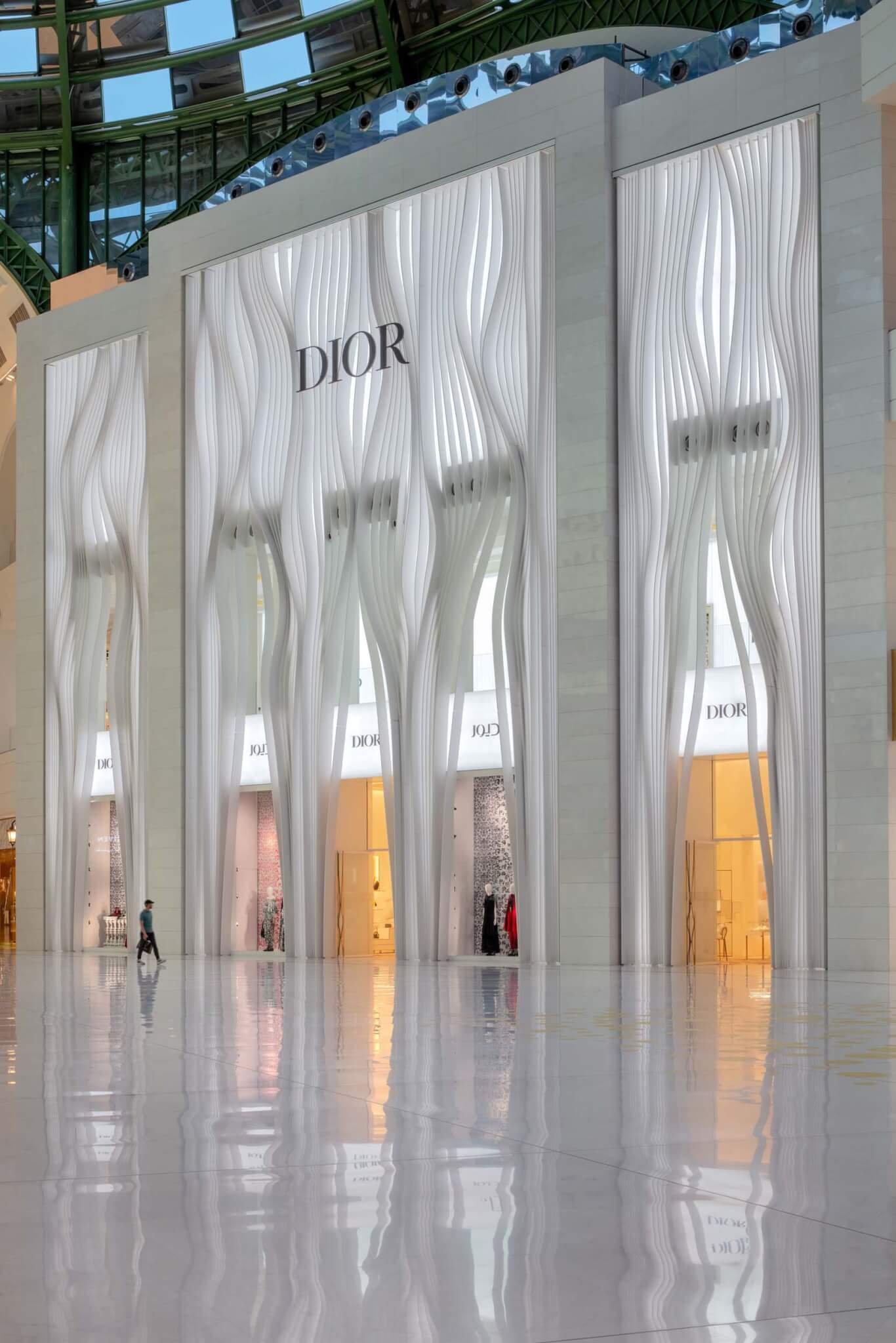 Aranda\Lasch pulls from Dior’s work to design a pleated facade for the brand’s Lusail storefront