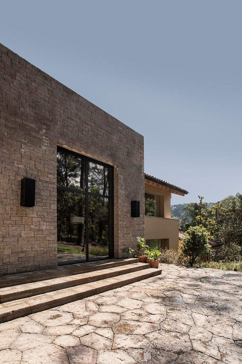 stone-built residence mesa de gallos reinterprets the mexican hacienda typology