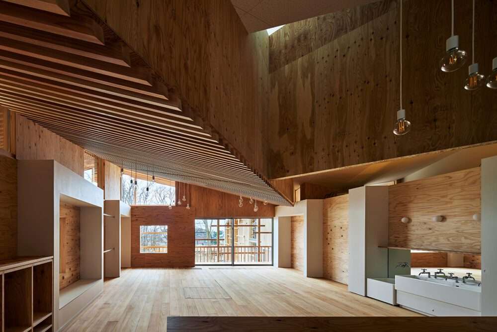 Nursery design with herringbone ceiling and wooden beams