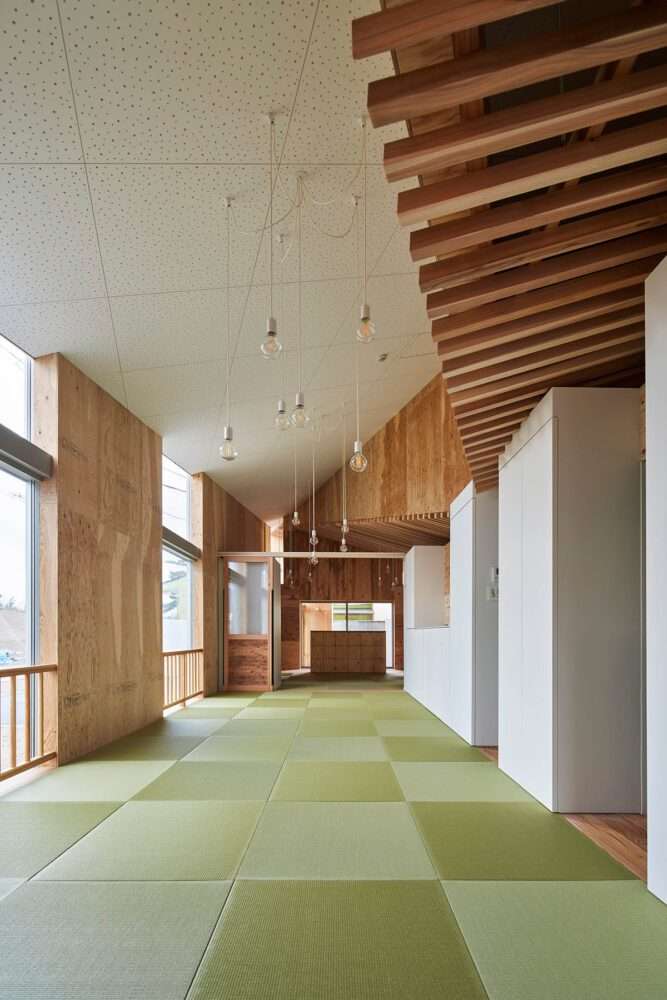 Nursery design with herringbone ceiling and wooden beams
